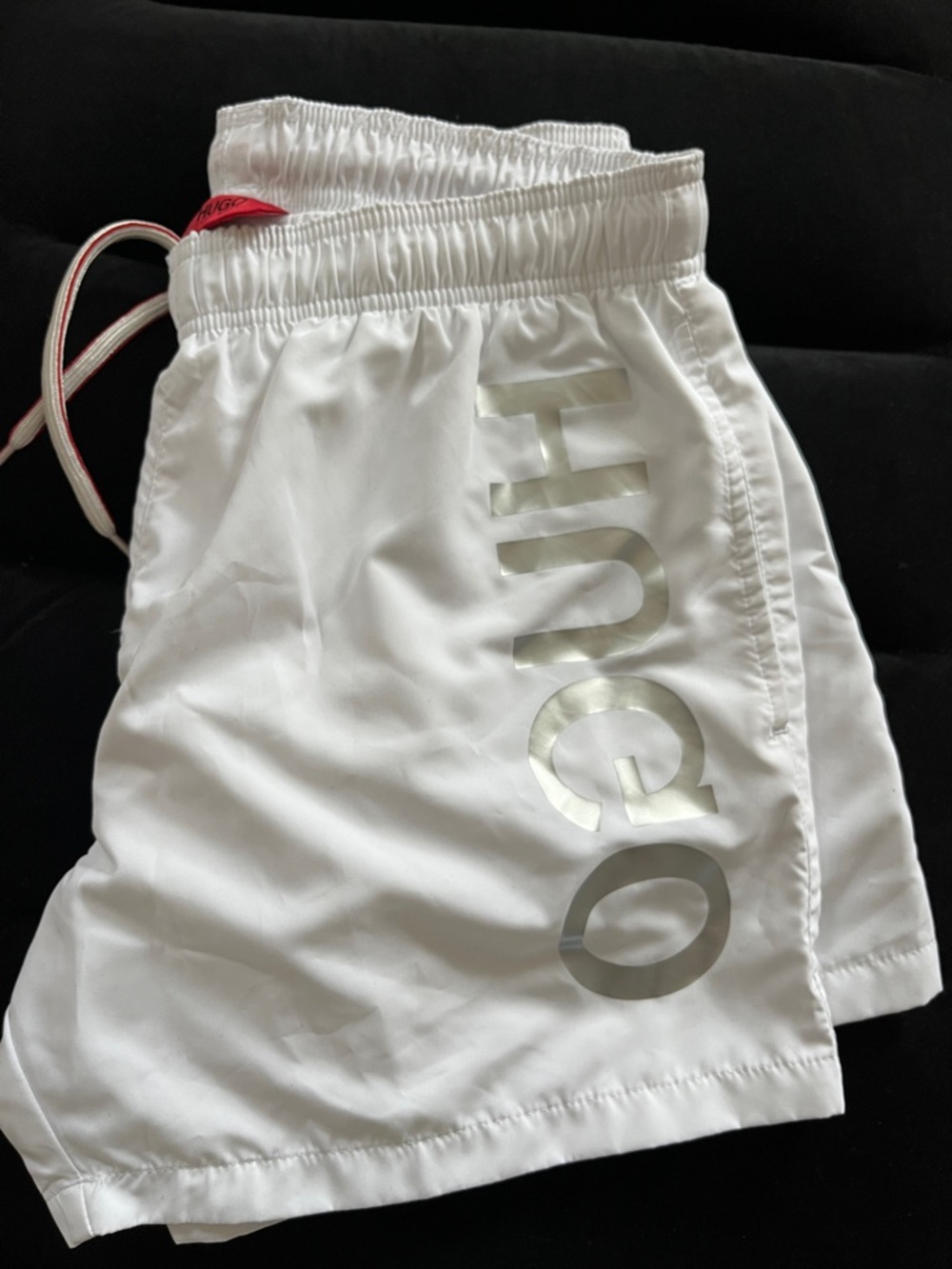 HUGO White Swim Shorts with Red Logo Tag